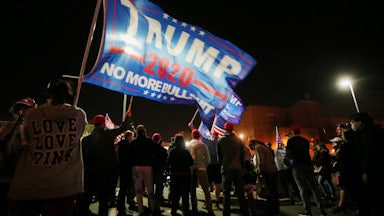 Supporters of President Donald Trump demonstrate in front of the Maricopa County Elections Department office on Election Day.