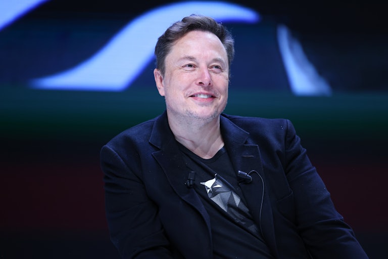 Elon Musk smiles