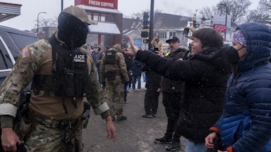 Protesters recording ICE agents in Minneapolis, Minnesota on January 21, 2026.