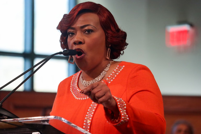Bernice King gestures while speaking at a podium