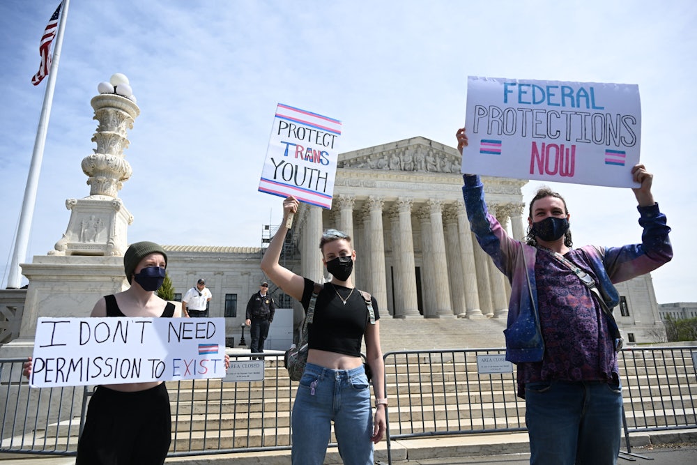 Transgender rights activists gather in front of the US Supreme Court last year.