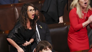Representatives Lauren Boebert and Marjorie Taylor Greene shout at Biden