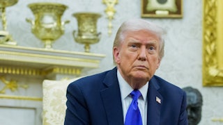 Donald Trump sits in his gold-filled Oval Office.