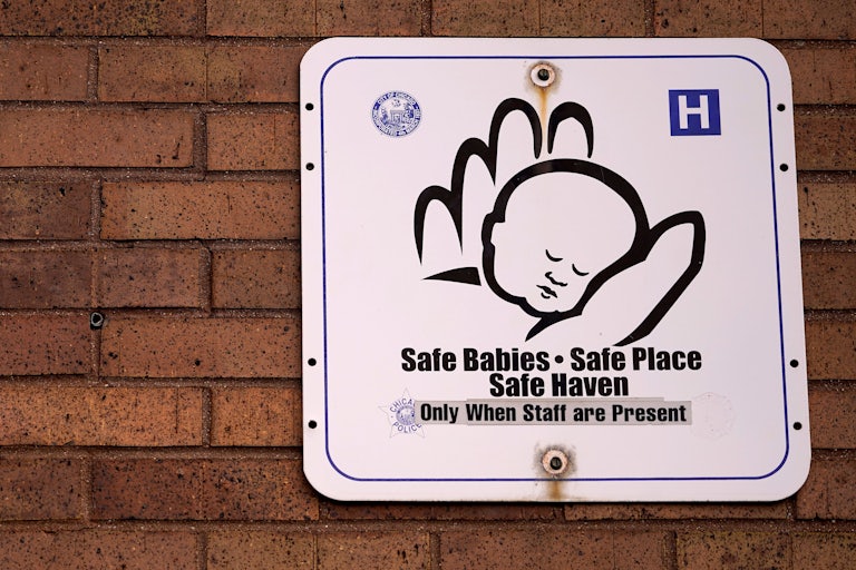 A Safe Haven sign hangs at a Chicago Fire Station