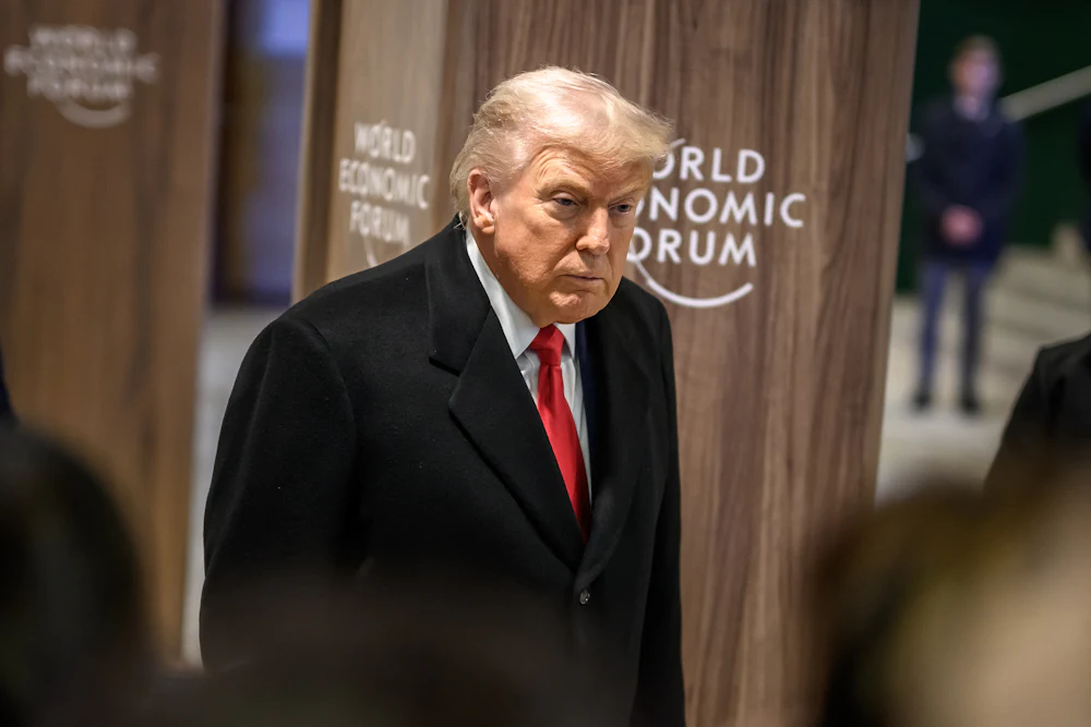 Donald Trump addresses the media as he leaves the congress centre during the World Economic Forum annual meeting in Davos.