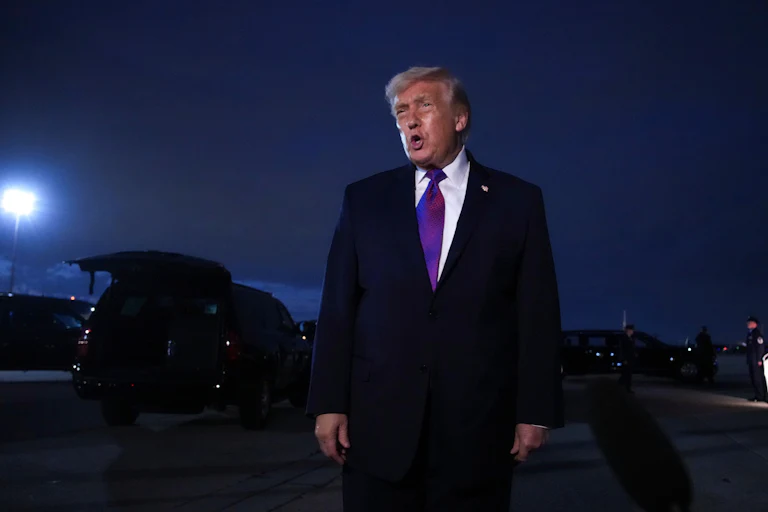 Donald Trump speaks to reporters