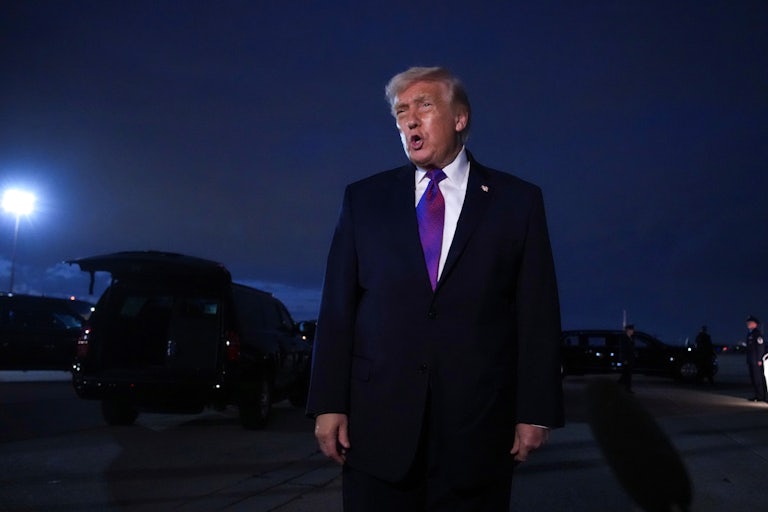 Donald Trump speaks to reporters