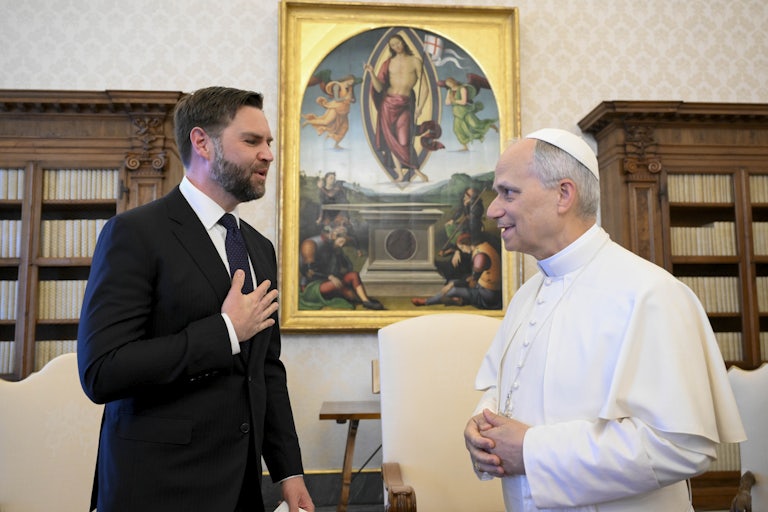 Vice President JD Vance puts his hand on his chest while speaking to Pope Leo XIV in the Vatican