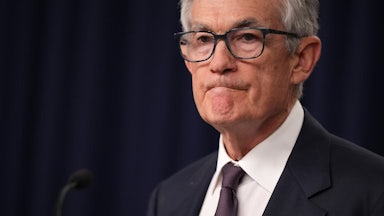 Jerome Powell purses his lips in a grim line.