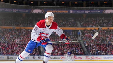 Ivan Demidov of the Montreal Canadiens skates across the ice during a hockey game.