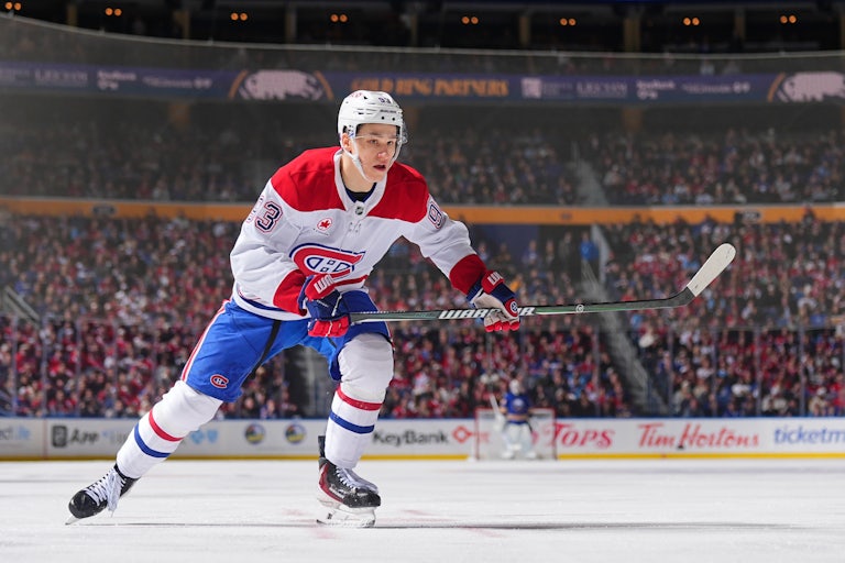 Ivan Demidov of the Montreal Canadiens skates across the ice during a hockey game.