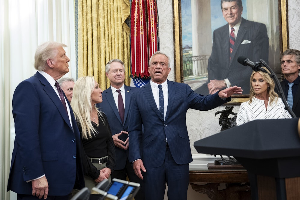 Donald Trump congratulates Robert F. Kennedy Jr., moments after he was sworn in as Health and Human Services Secretary in the Oval Office.