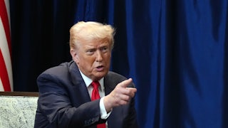 Donald Trump points as he speaks