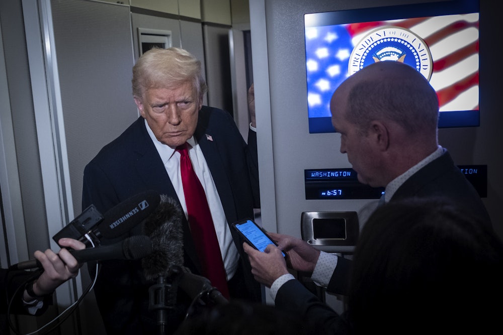 Trump speaking to reporters on Air Force One