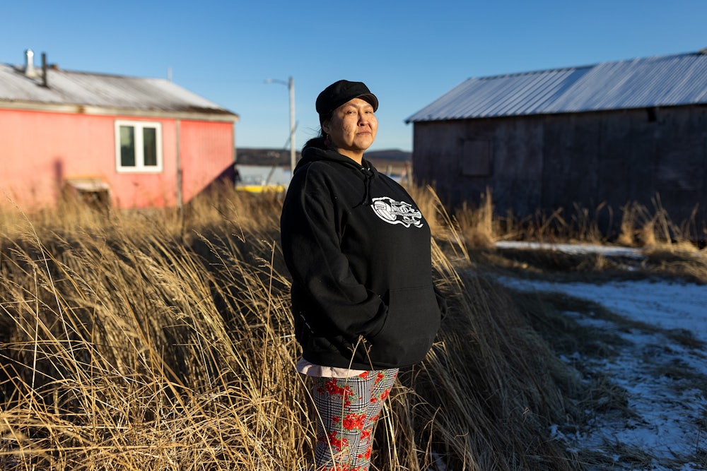 A portrait of RaShawn Foxglove who is a cashier at Ransom’s Grocery Store in Unalakleet, Alaska, photographed outside