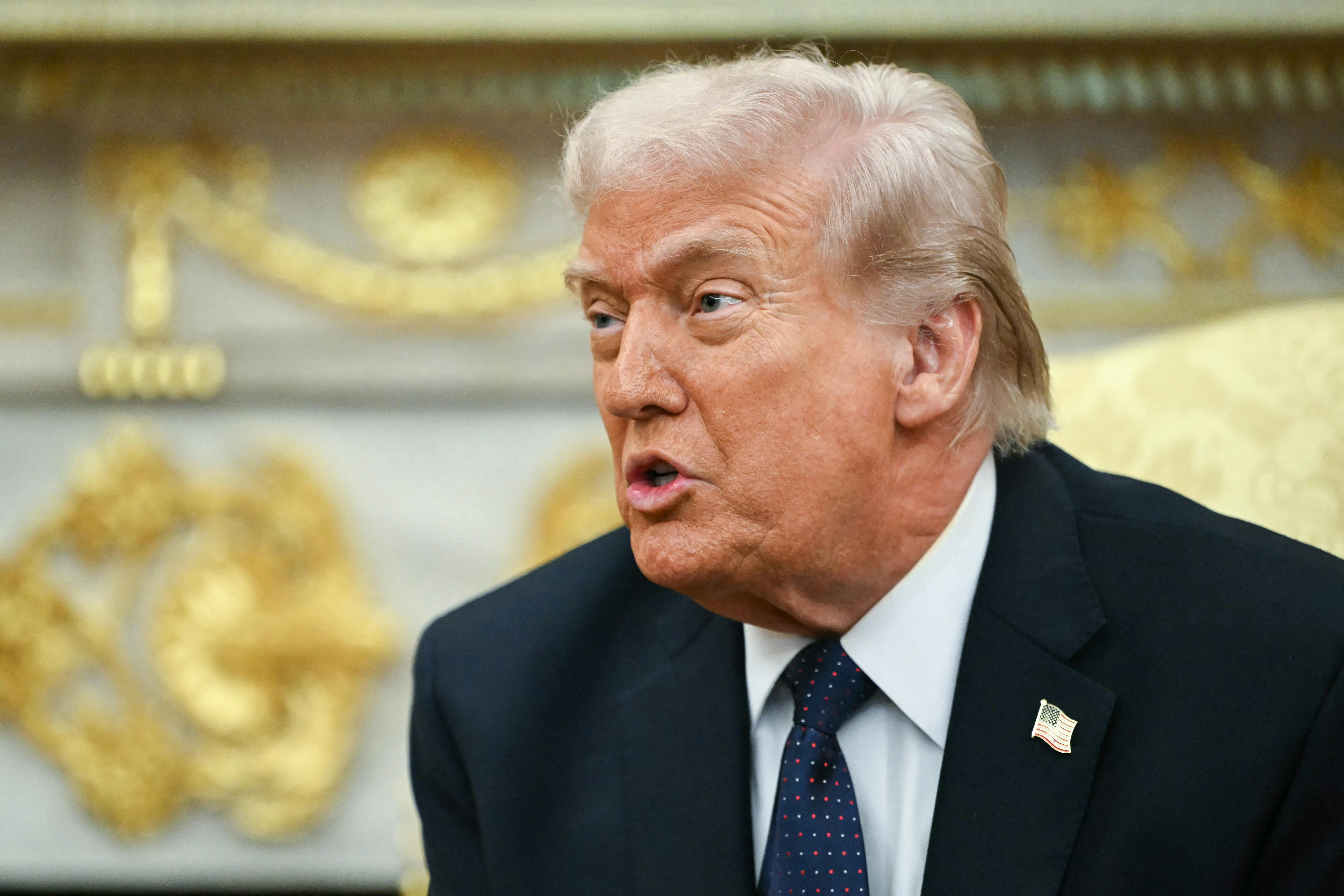 Donald Trump speaking in the (gold) Oval Office of the White House