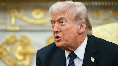 Donald Trump speaking in the (gold) Oval Office of the White House