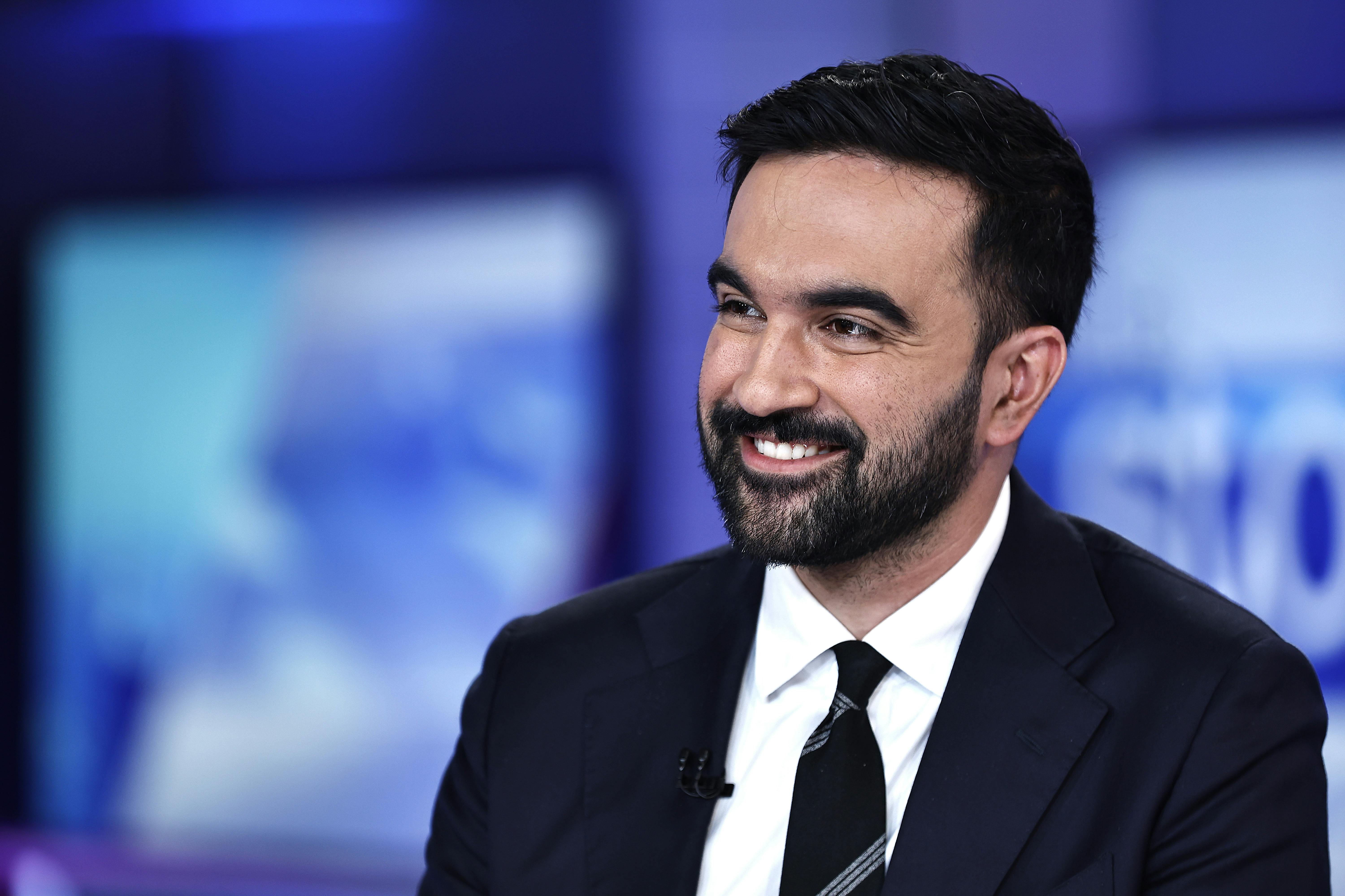 New York City mayoral candidate Zohran Mamdani smiles while sitting on set at Fox News
