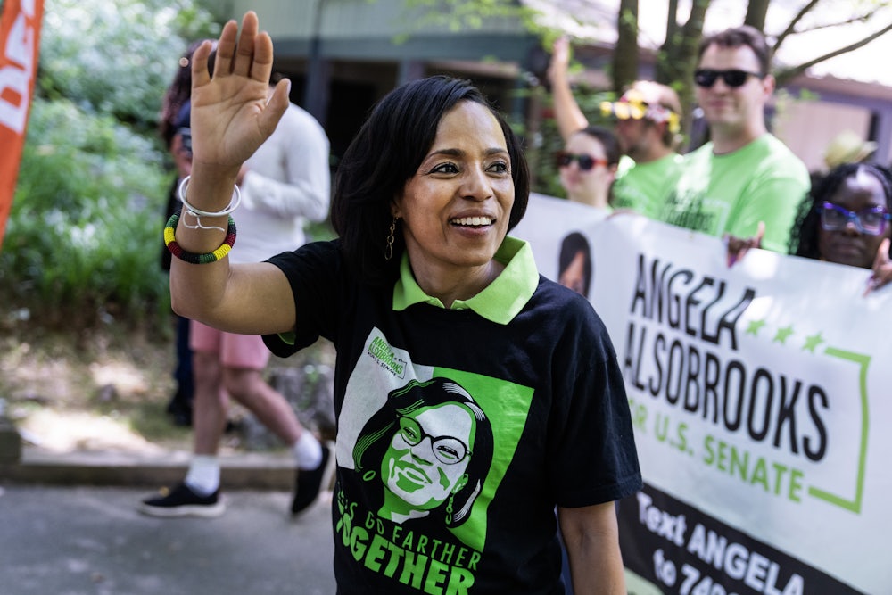 Angela Alsobrooks, Maryland’s Democratic nominee for U.S. Senate, walks in a parade during the Scotland Juneteenth Heritage Festival in Bethesda