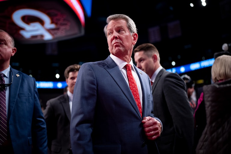 Georgia Governor Brian Kemp looks to the side at the Republican National Convention