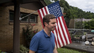 Beshear visits a house with flood damage in Whitesburg, Kentucky