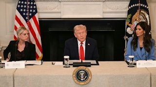 President Donald Trump, flanked by Attorney General Pam Bondi and Homeland Security Secretary Kristi Noem, speaks during a roundtable about Antifa in the State Dining Room of the White House.