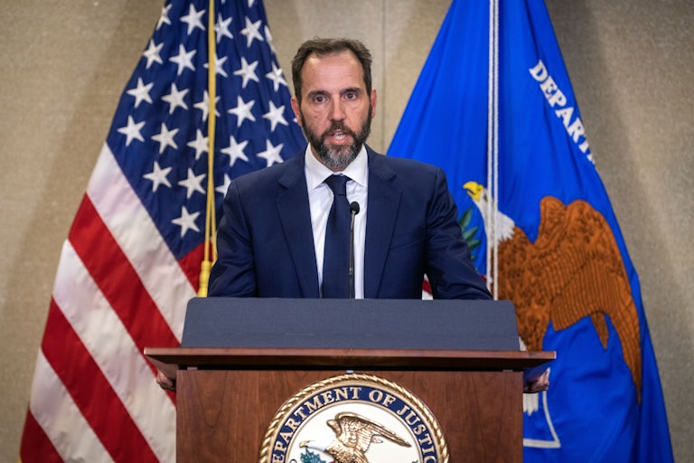 Jack Smith speaks at a podium