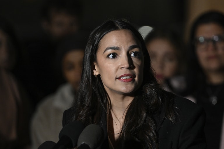 AOC at a press conference.
