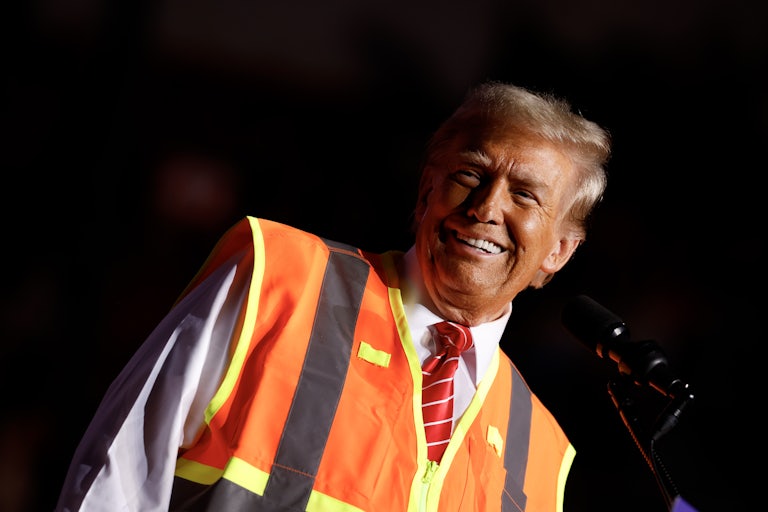 Donald Trump wearing a garbage collector vest
