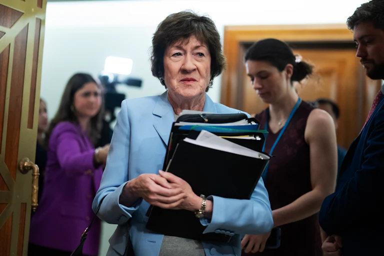 Susan Collins arrives for a committee hearing.