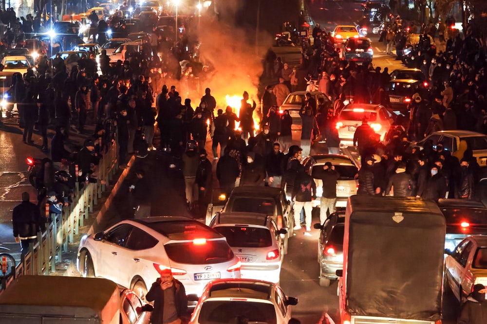 People gather during protest on January 8, 2026 in Tehran, Iran. Demonstrations have been ongoing since December, triggered by soaring inflation and the collapse of the rial, and have expanded into broader demands for political change.