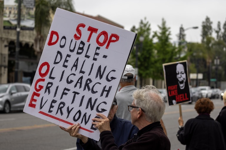 People protest against Elon Musk and DOGE
