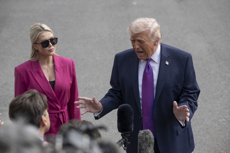 President Donald Trump yells at reporters as White House press secretary Karoline Leavitt stands nearby.