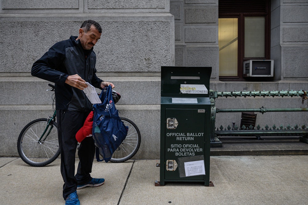 A voter casts their ballot at a drop box outside Philadelphia City Hall. Pennsylvania is one of numerous states where control of the state legislature is on the line in this year's midterm elections.