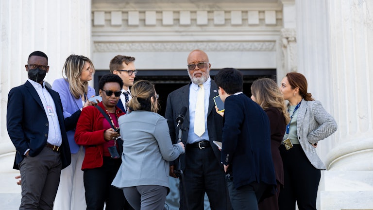 January 6 Commission Chair Bennie Thompson speaks with reporters on the steps of the U.S. Capitol.