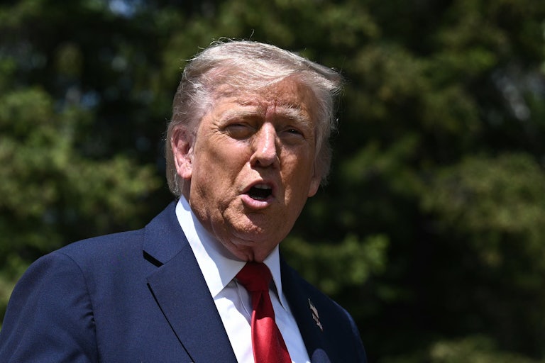 Donald Trump speaks to reporters at the G7 summit in Canada
