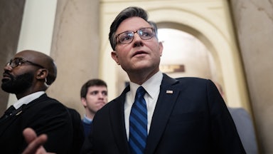 House Speaker Mike Johnson walks in the Capitol