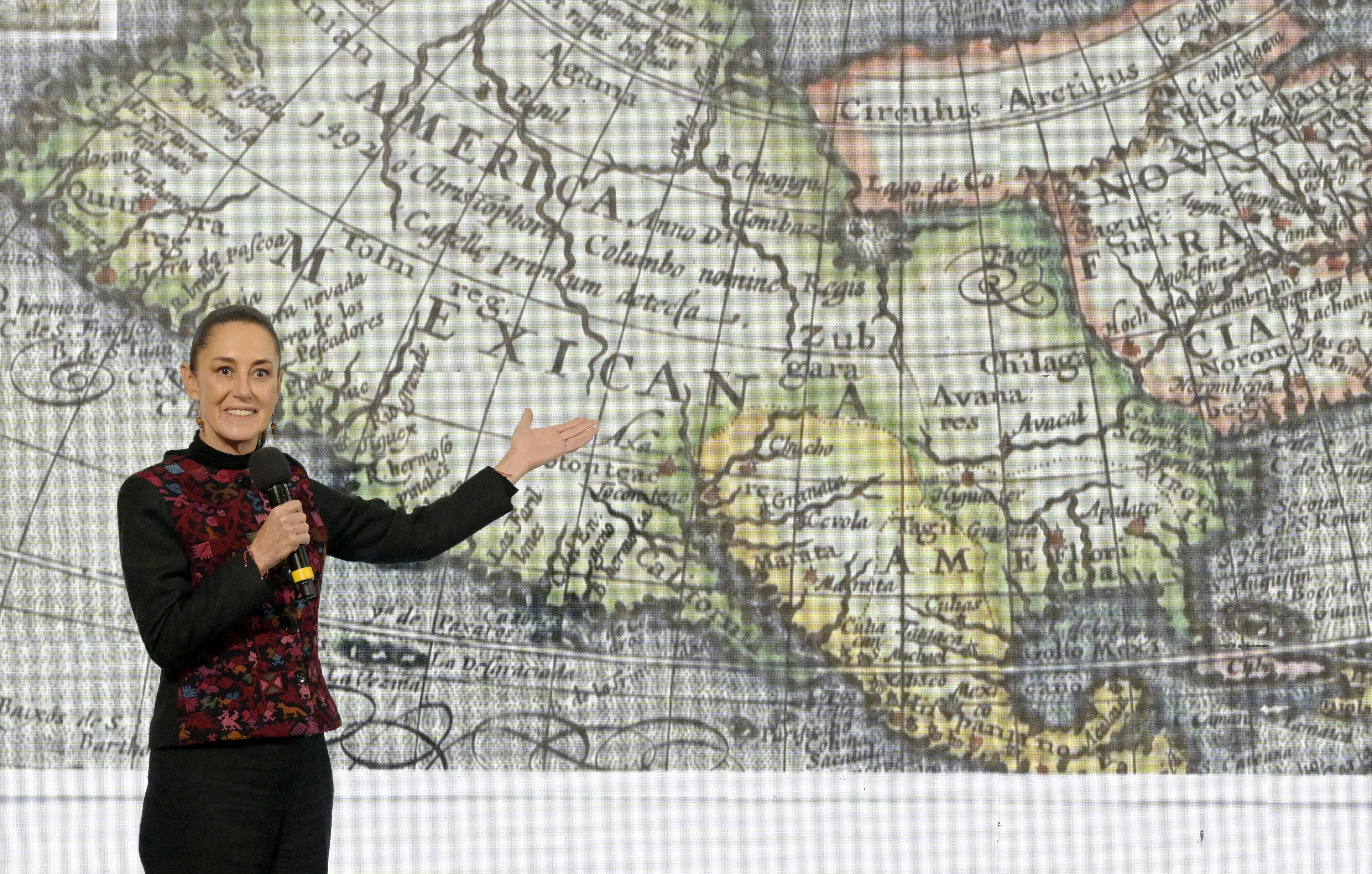 Mexico's President Claudia Sheinbaum speaks during her daily conference in front of a map of Mexico.at the National Palace in Mexico City on January 8, 2025.