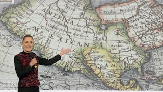 Mexico's President Claudia Sheinbaum speaks during her daily conference in front of a map of Mexico.at the National Palace in Mexico City on January 8, 2025.