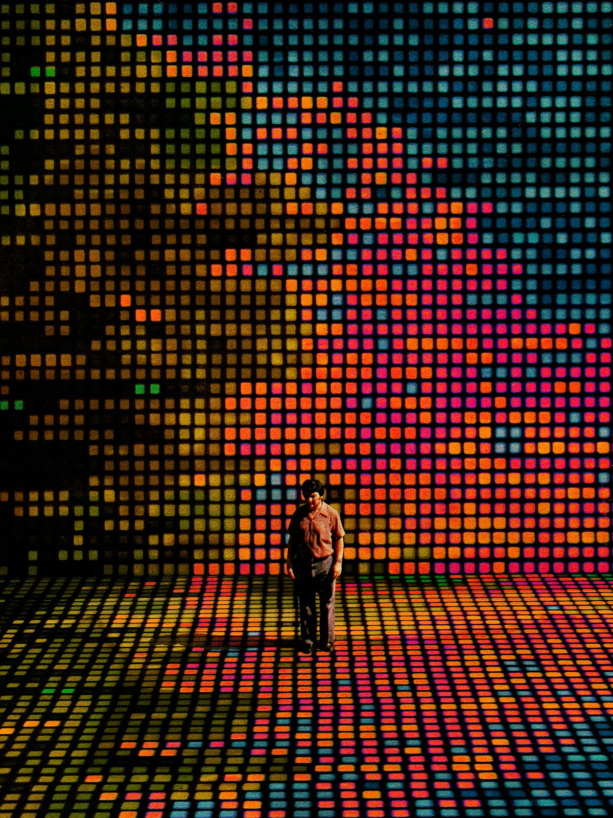 An illustration of a man standing on a stage of computer pixels