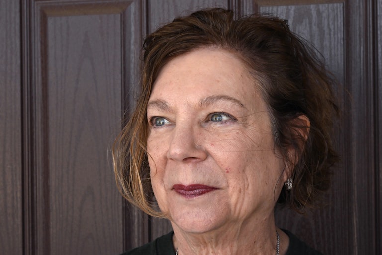 Marilyn Lands smiles and looks off camera