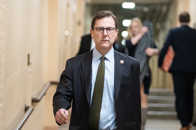Representative Thomas Kean Jr. walks in the Capitol