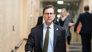 Representative Thomas Kean Jr. walks in the Capitol