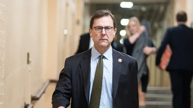 Representative Thomas Kean Jr. walks in the Capitol