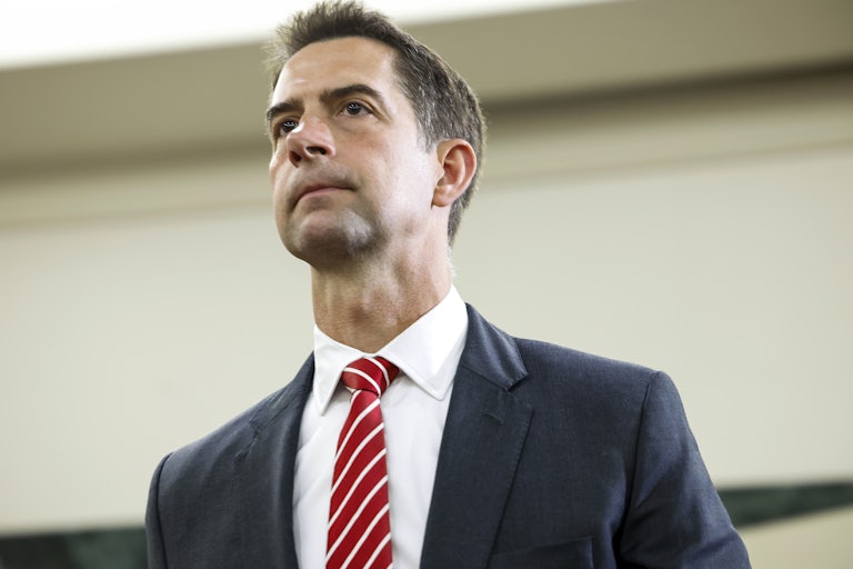 Tom Cotton looks off camera (photo shot from below, he looks serious)