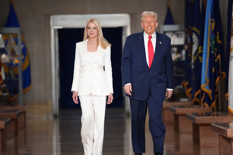 Attorney General Pam Bondi and Donald Trupm walk side by side