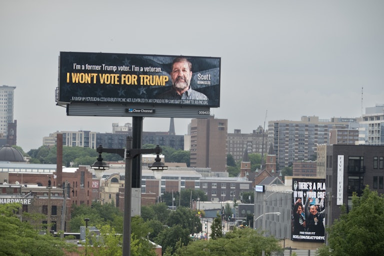 A billboard featuring a former Donald Trump voter saying he won’t vote for Trump again