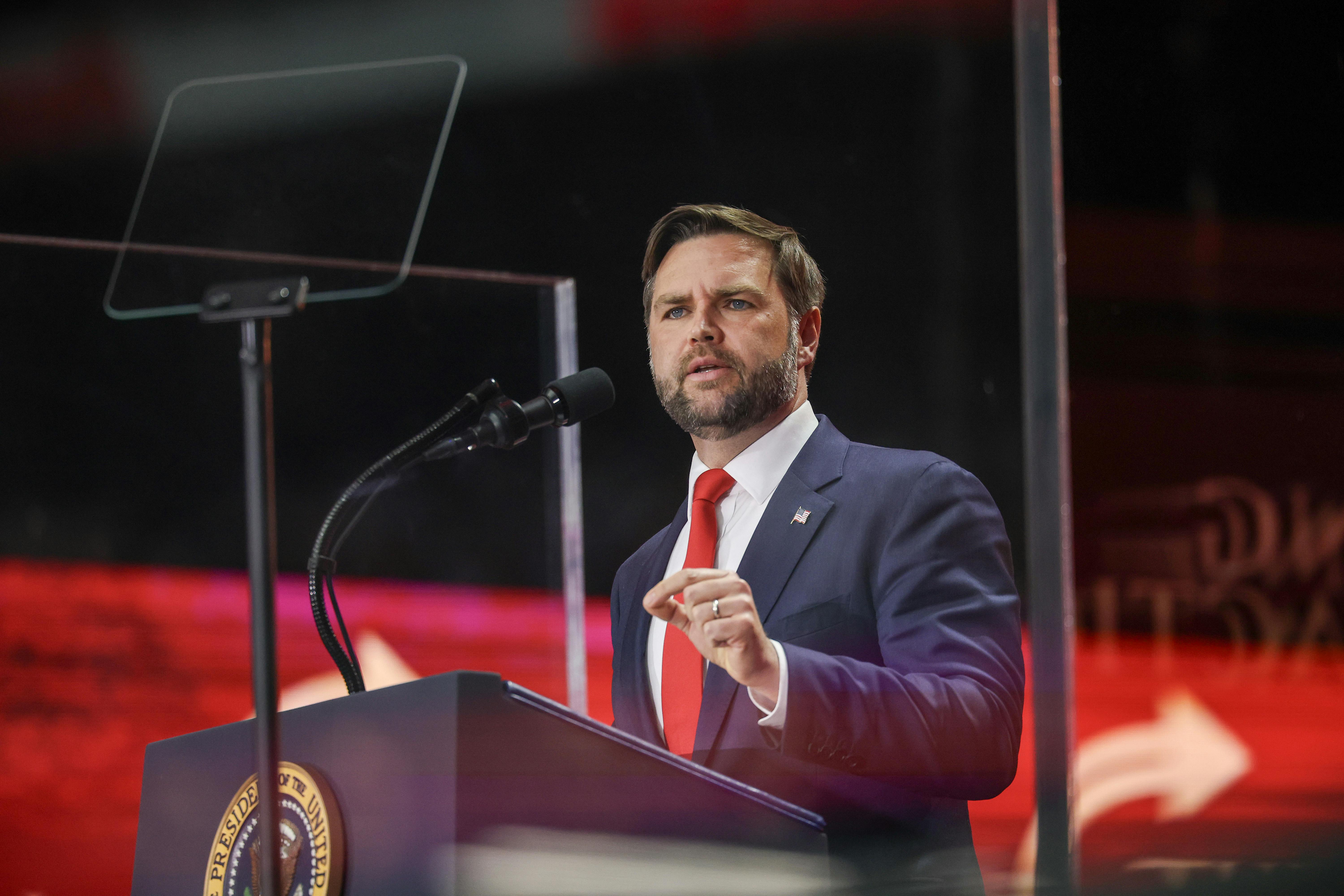 Vice President JD Vance gestures while speaking at Charlie Kirk's memorial