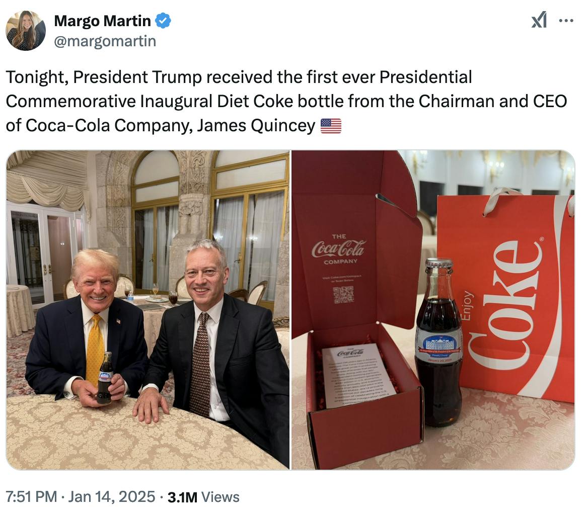 Twitter screenshot Margo Martin @margomartin Tonight, President Trump received the first ever Presidential Commemorative Inaugural Diet Coke bottle from the Chairman and CEO of Coca-Cola Company, James Quincey 🇺🇸 One photo of Trump and Quincey, and one photo of the Coke bottle