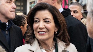 Kathy Hochul stands in a crowd.
